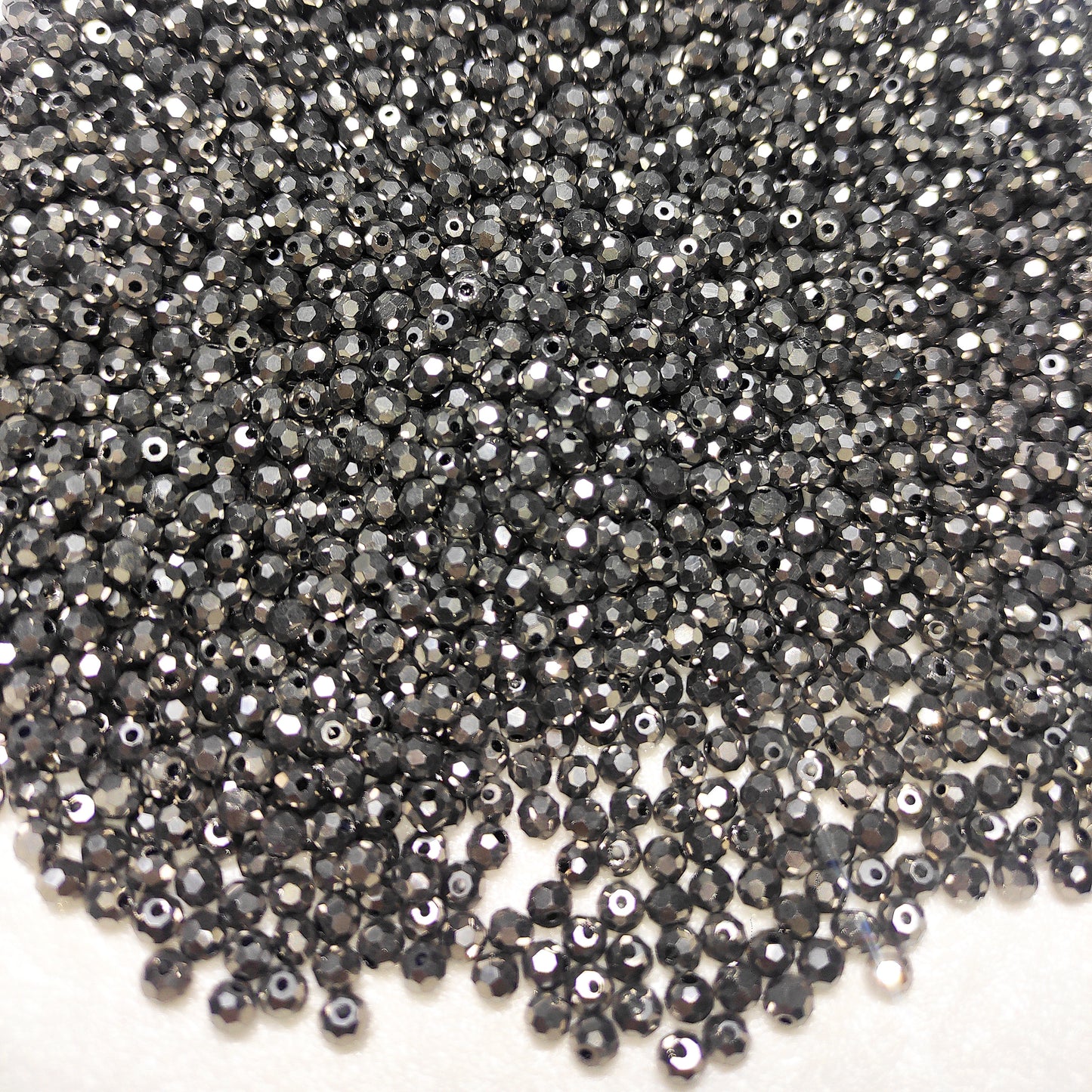 [121] Silver Faceted Round 4mm